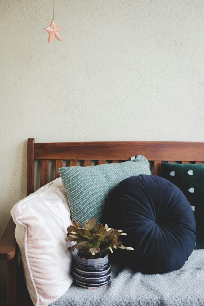 assorted throw pillows on sofa